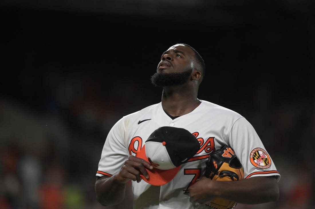 Aug 22, 2023; Baltimore, Maryland, USA; Baltimore Orioles relief pitcher Felix Bautista (74) walks off the field after pitching the ninth inning against the Toronto Blue Jays  at Oriole Park at Camden Yards. Mandatory Credit: Tommy Gilligan-USA TODAY Sports