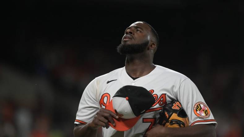 Aug 22, 2023; Baltimore, Maryland, USA; Baltimore Orioles relief pitcher Felix Bautista (74) walks off the field after pitching the ninth inning against the Toronto Blue Jays  at Oriole Park at Camden Yards. Mandatory Credit: Tommy Gilligan-USA TODAY Sports