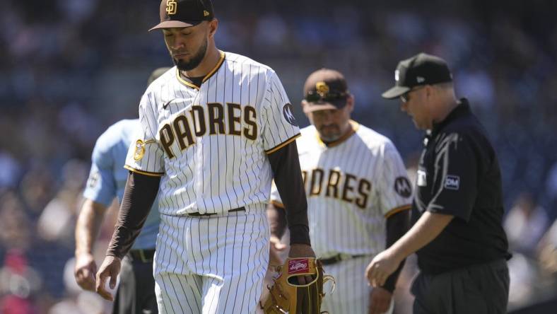 Aug 23, 2023; San Diego, California, USA;  San Diego Padres relief pitcher Robert Suarez (75) is ejected before throwing a pitch against the Miami Marlins during the seventh inning at Petco Park. Mandatory Credit: Ray Acevedo-USA TODAY Sports