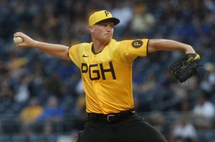 Aug 25, 2023; Pittsburgh, Pennsylvania, USA; Pittsburgh Pirates starting pitcher Mitch Keller (23) delivers a pitch against the Chicago Cubs during the first inning at PNC Park. Mandatory Credit: Charles LeClaire-USA TODAY Sports