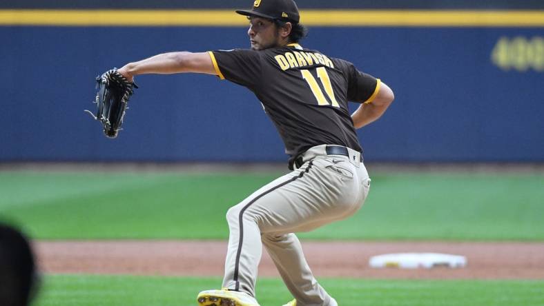 Aug 25, 2023; Milwaukee, Wisconsin, USA; San Diego Padres starting pitcher Yu Darvish (11) delivers a pitch against the Milwaukee Brewers in the first inning at American Family Field. Mandatory Credit: Michael McLoone-USA TODAY Sports