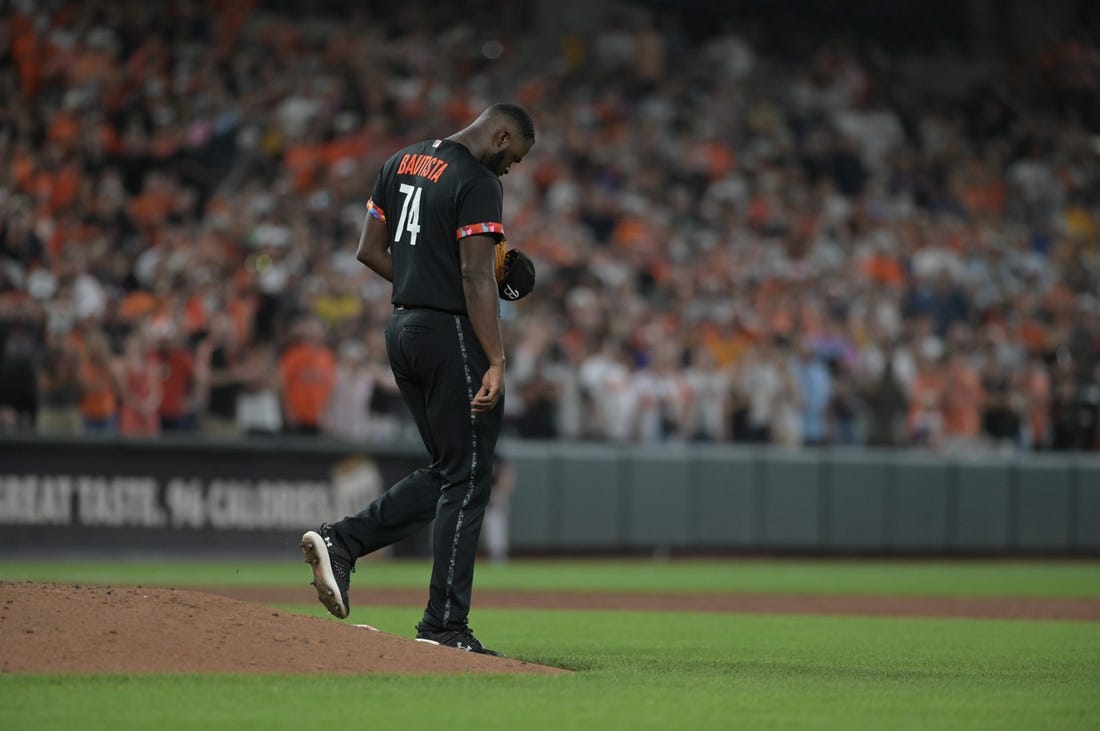 Aug 25, 2023; Baltimore, Maryland, USA;  Baltimore Orioles relief pitcher Felix Bautista (74) walks off the pitcher's mound after slipping while throwing a ninth inning pitch against the Colorado Rockies at Oriole Park at Camden Yards. Mandatory Credit: Tommy Gilligan-USA TODAY Sports