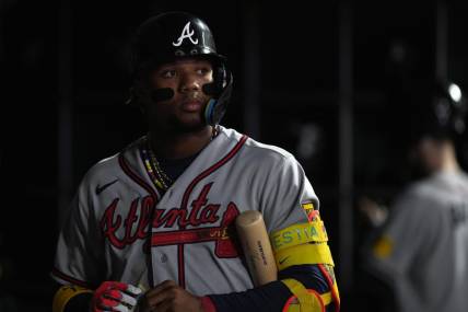 Aug 25, 2023; San Francisco, California, USA; Atlanta Braves right fielder Ronald Acuna Jr. (13) stands in the dugout during the fifth inning against the San Francisco Giants at Oracle Park. Mandatory Credit: Darren Yamashita-USA TODAY Sports