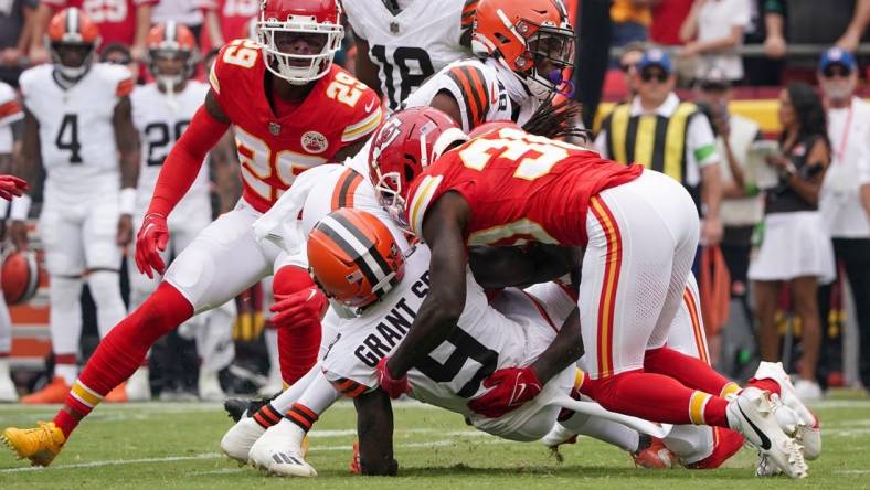 Aug 26, 2023; Kansas City, Missouri, USA; Cleveland Browns wide receiver Jakeem Grant Sr. (9) suffers an apparent injury on a kickoff return against the Kansas City Chiefs at GEHA Field at Arrowhead Stadium. Mandatory Credit: Denny Medley-USA TODAY Sports