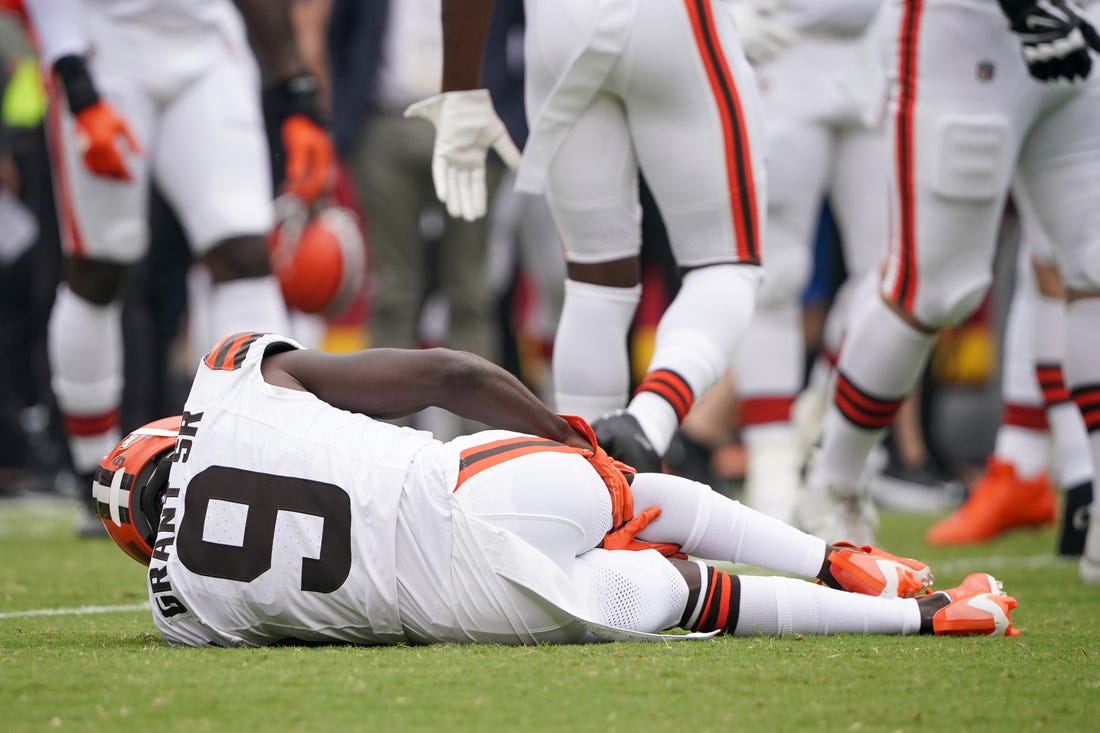 Aug 26, 2023; Kansas City, Missouri, USA; Cleveland Browns wide receiver Jakeem Grant Sr. (9) reacts after suffering an apparent injury on a kickoff return against the Kansas City Chiefs at GEHA Field at Arrowhead Stadium. Mandatory Credit: Denny Medley-USA TODAY Sports