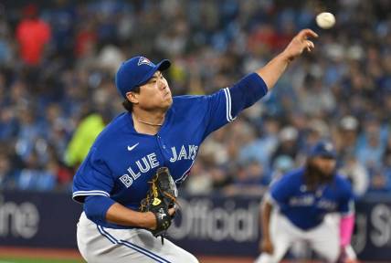 Aug 26, 2023; Toronto, Ontario, CAN;  Toronto Blue Jays starting pitcher Hyun Jin Ryu (99) delivers against the Cleveland Guardians in the first inning at Rogers Centre. Mandatory Credit: Dan Hamilton-USA TODAY Sports