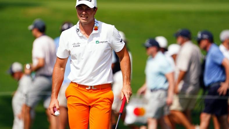 Aug 26, 2023; Atlanta, Georgia, USA; Viktor Hovland after putt out on the fifth green during the third round of the TOUR Championship golf tournament at East Lake Golf Club. Mandatory Credit: John David Mercer-USA TODAY Sports