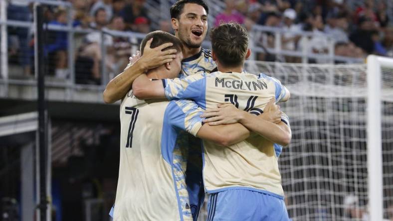 Aug 26, 2023; Washington, District of Columbia, USA; Philadelphia Union forward Mikael Uhre (7) celebrates with teammates after scoring a goal past D.C. United goalkeeper Tyler Miller (not pictured) during the first half at Audi Field. Mandatory Credit: Amber Searls-USA TODAY Sports