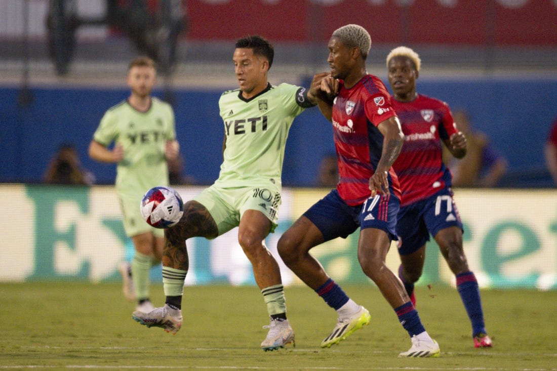 Aug 26, 2023; Frisco, Texas, USA; Austin FC forward Sebastian Driussi (10) and FC Dallas defender Nkosi Tafari (17) battle for control of the ball during the first half at Toyota Stadium. Mandatory Credit: Jerome Miron-USA TODAY Sports