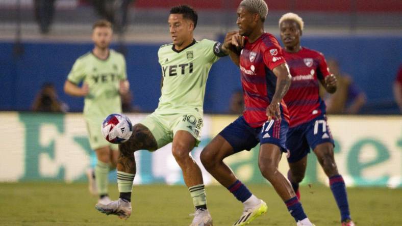 Aug 26, 2023; Frisco, Texas, USA; Austin FC forward Sebastian Driussi (10) and FC Dallas defender Nkosi Tafari (17) battle for control of the ball during the first half at Toyota Stadium. Mandatory Credit: Jerome Miron-USA TODAY Sports