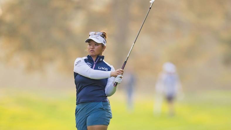 Aug 26, 2023; Vancouver, British Columbia, CAN; Megan Khang hits on the eighteenth hole during the third round of the CPKC Women's Open golf tournament at Shaughnessy Golf & Country Club. Mandatory Credit: Bob Frid-USA TODAY Sports