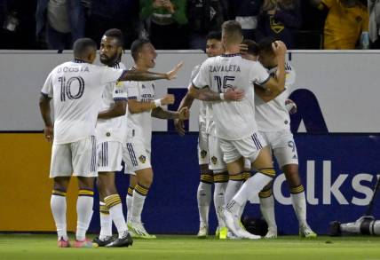 Aug 26, 2023; Carson, California, USA;  Los Angeles Galaxy players celebrate after a goal by midfielder Tyler Boyd (11) in the first half against the Chicago Fire at Dignity Health Sports Park. Mandatory Credit: Jayne Kamin-Oncea-USA TODAY Sports