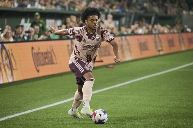 Aug 26, 2023; Portland, Oregon, USA; Portland Timbers midfielder Evander (20) controls the ball during the second half against the Vancouver Whitecaps at Providence Park. Mandatory Credit: Troy Wayrynen-USA TODAY Sports