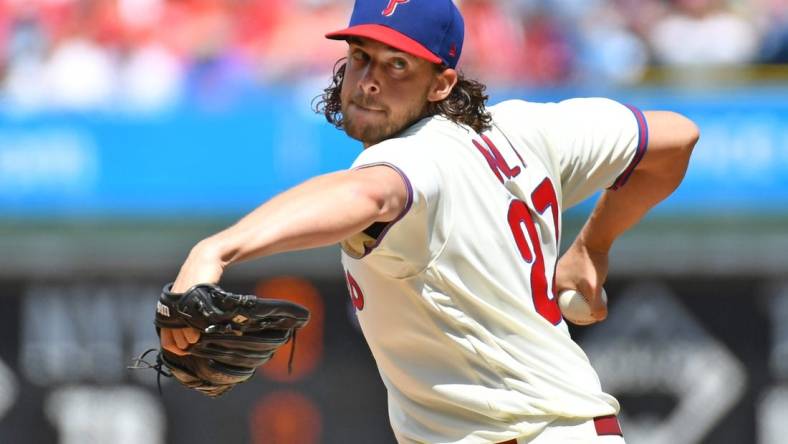 Aug 27, 2023; Philadelphia, Pennsylvania, USA; Philadelphia Phillies starting pitcher Aaron Nola (27) throws a pitch against the St. Louis Cardinals during the first inning at Citizens Bank Park. Mandatory Credit: Eric Hartline-USA TODAY Sports