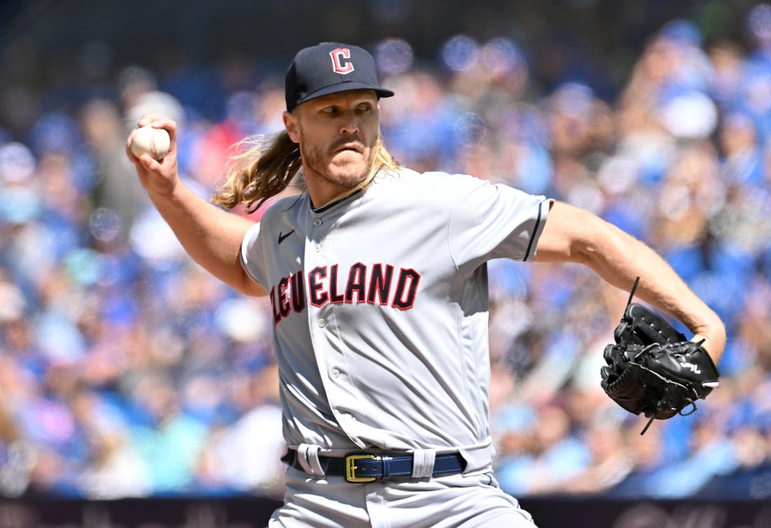 Aug 27, 2023; Toronto, Ontario, CAN;  Cleveland Guardians starting pitcher Noah Syndergaard (34) delivers a pitch against the Toronto Blue Jays in the first inning at Rogers Centre. Mandatory Credit: Dan Hamilton-USA TODAY Sports