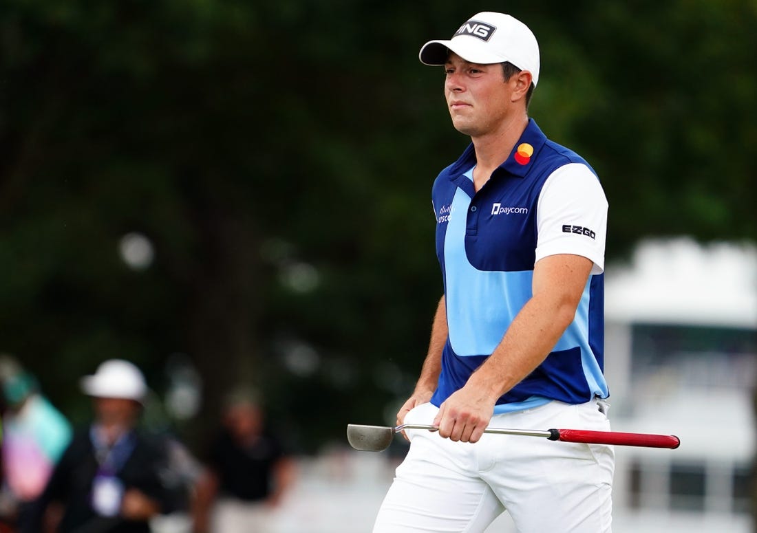 Aug 27, 2023; Atlanta, Georgia, USA; Viktor Hovland walks up to the first green during the final round of the TOUR Championship golf tournament at East Lake Golf Club. Mandatory Credit: John David Mercer-USA TODAY Sports