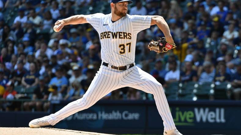 Aug 27, 2023; Milwaukee, Wisconsin, USA; Milwaukee Brewers starting pitcher Adrian Houser (37) delivers a pitch against the San Diego Padres in the first inning at American Family Field. Mandatory Credit: Michael McLoone-USA TODAY Sports