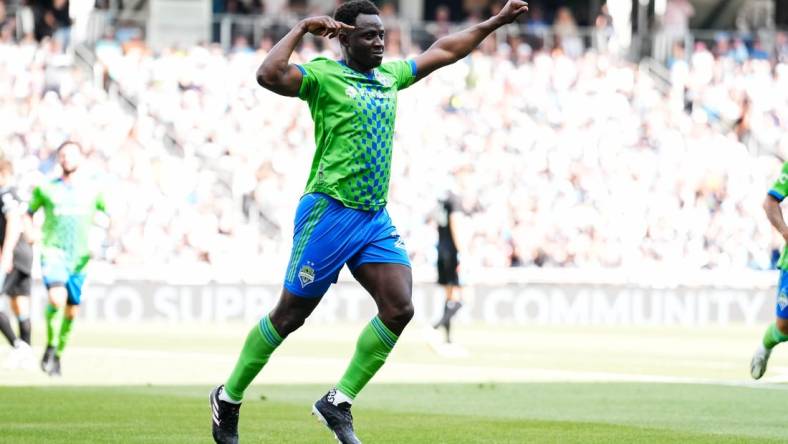 Aug 27, 2023; Saint Paul, Minnesota, USA; Seattle Sounders defender Yeimar Gomez (28) celebrates his goal during the first half against Minnesota United at Allianz Field. Mandatory Credit: Brace Hemmelgarn-USA TODAY Sports