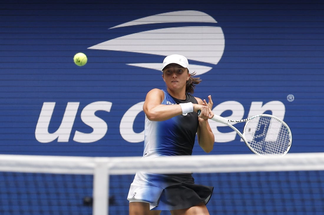 Aug 28, 2023; Flushing, NY, USA; Iga Swiatek of Poland hits a forehand against Rebecca Peterson of Sweden (not pictured) on day one of the 2023 US Open at the Billie Jean King National Tennis Center. Mandatory Credit: Geoff Burke-USA TODAY Sports