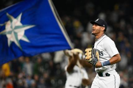 Aug 28, 2023; Seattle, Washington, USA; Seattle Mariners center fielder Julio Rodriguez (44) jogs off the field after the Mariners defeated the Oakland Athletics at T-Mobile Park. Mandatory Credit: Steven Bisig-USA TODAY Sports