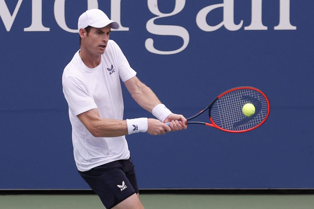 Aug 29, 2023; Flushing, NY, USA; Andy Murray of Great Britain hits a backhand against Corentin Moutet of France (not pictured) on day two of the 2023 U.S. Open tennis tournament at USTA Billie Jean King National Tennis Center. Mandatory Credit: Geoff Burke-USA TODAY Sports