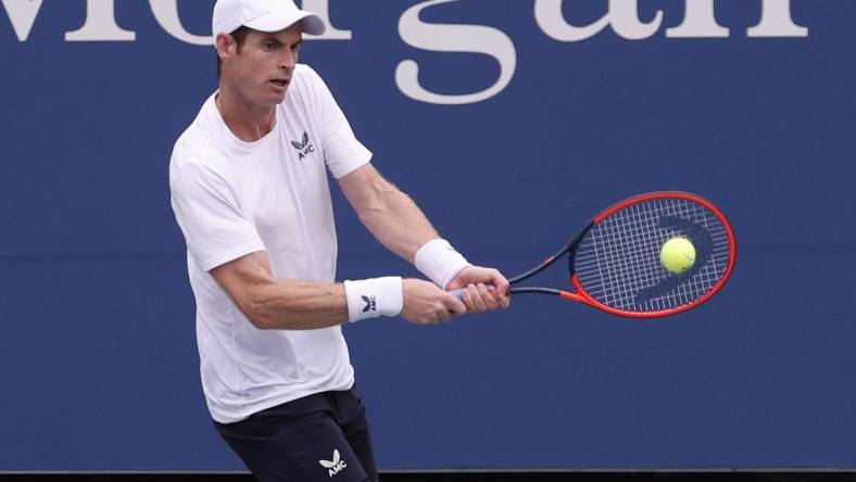 Aug 29, 2023; Flushing, NY, USA; Andy Murray of Great Britain hits a backhand against Corentin Moutet of France (not pictured) on day two of the 2023 U.S. Open tennis tournament at USTA Billie Jean King National Tennis Center. Mandatory Credit: Geoff Burke-USA TODAY Sports