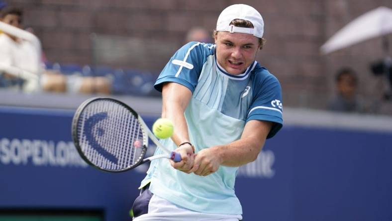 Aug 30, 2023; Flushing, NY, USA; Dominic Stricker of Switzerland hits to Stefanos Tsitsipas of Greece on day three of the 2023 U.S. Open tennis tournament at USTA Billie Jean King National Tennis Center. Mandatory Credit: Danielle Parhizkaran-USA TODAY Sports