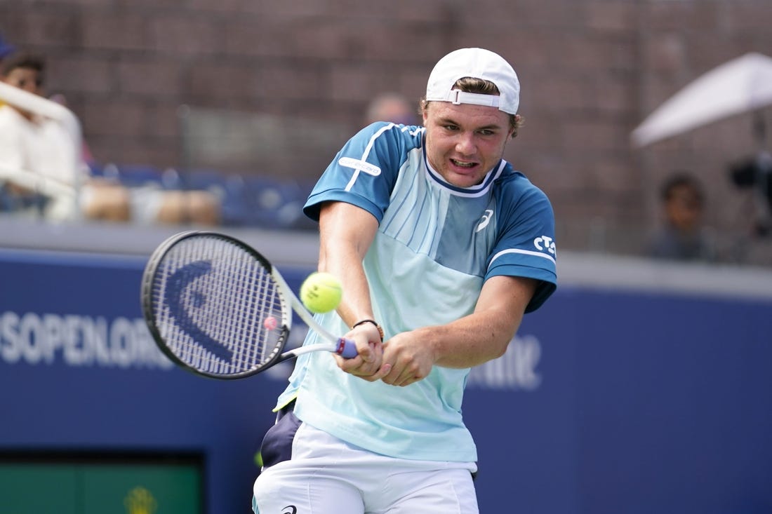 Aug 30, 2023; Flushing, NY, USA; Dominic Stricker of Switzerland hits to Stefanos Tsitsipas of Greece on day three of the 2023 U.S. Open tennis tournament at USTA Billie Jean King National Tennis Center. Mandatory Credit: Danielle Parhizkaran-USA TODAY Sports