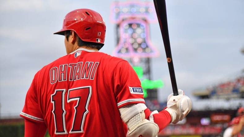 Aug 28, 2023; Philadelphia, Pennsylvania, USA; Los Angeles Angels designated hitter Shohei Ohtani (17) on deck against the Philadelphia Phillies at Citizens Bank Park. Mandatory Credit: Eric Hartline-USA TODAY Sports