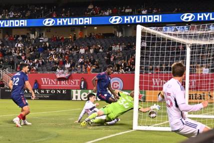 August 30, 2023; Chicago, Illinois, Vancouver Whitecaps forward Brian White (24) scores a goal against Chicago Fire FC during first half USA; at Soldier Field. Mandatory Credit: Jamie Sabau-USA TODAY Sports