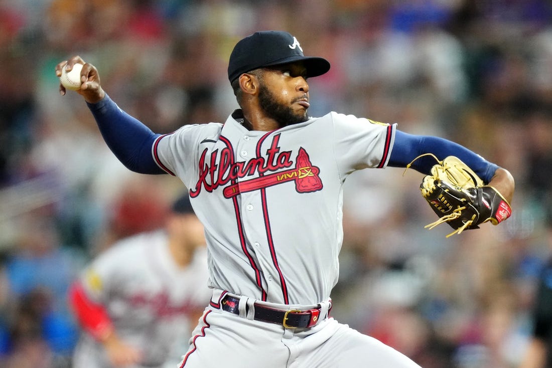 Aug 30, 2023; Denver, Colorado, USA; Atlanta Braves starting pitcher Darius Vines (64) delivers a pitch in the fourth inning against the Colorado Rockies at Coors Field. Mandatory Credit: Ron Chenoy-USA TODAY Sports