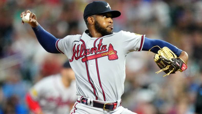 Aug 30, 2023; Denver, Colorado, USA; Atlanta Braves starting pitcher Darius Vines (64) delivers a pitch in the fourth inning against the Colorado Rockies at Coors Field. Mandatory Credit: Ron Chenoy-USA TODAY Sports