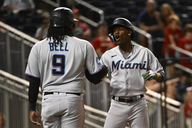 Aug 31, 2023; Washington, District of Columbia, USA; Miami Marlins center fielder Jazz Chisholm Jr. (2) celebrates with first baseman Josh Bell (9) after hitting a three run home run against the Washington Nationals during the fifth inning  at Nationals Park. Mandatory Credit: Brad Mills-USA TODAY Sports