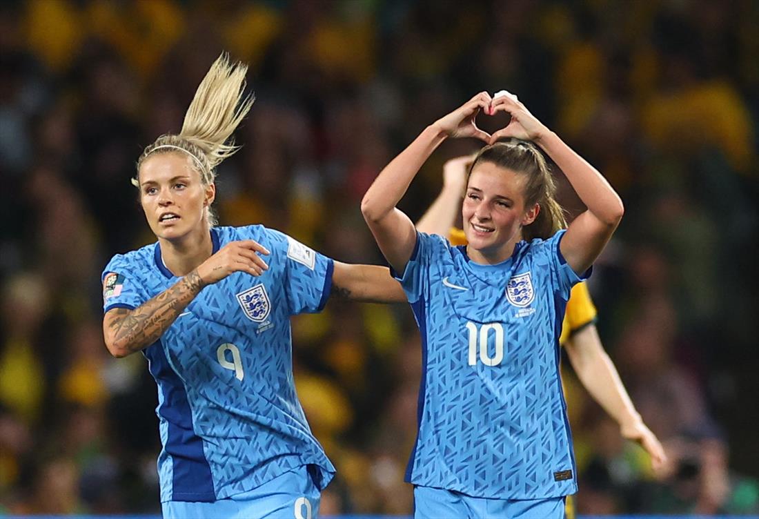 England's Ella Toone celebrates scoring their first goal with Rachel Daly.