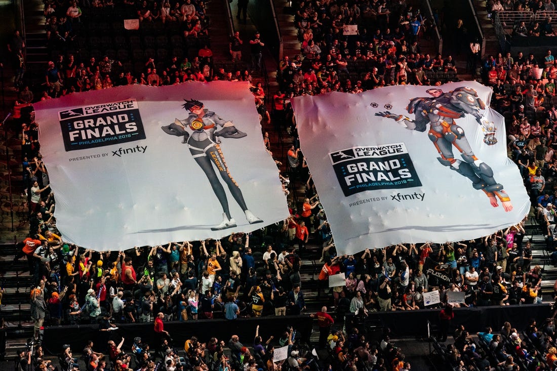 Sep 29, 2019; Philadelphia, PA, USA; Fans raise a tifo during the Overwatch League Grand Finals e-sports event at Wells Fargo Center. Mandatory Credit: Bill Streicher-USA TODAY Sports