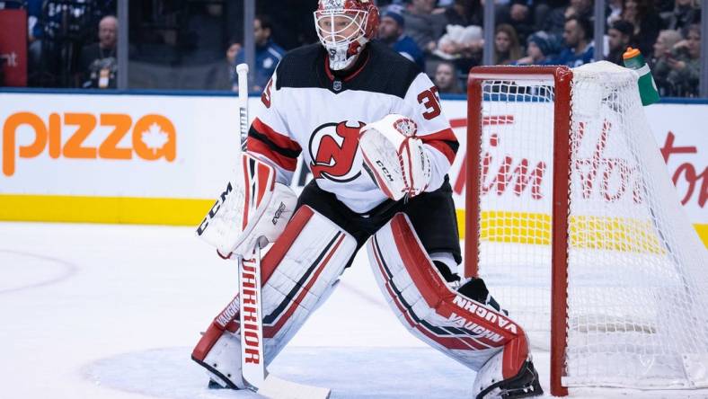 Jan 14, 2020; Toronto, Ontario, CAN; New Jersey Devils goaltender Cory Schneider (35) follows the play during the second period against the Toronto Maple Leafs at Scotiabank Arena. Mandatory Credit: Nick Turchiaro-USA TODAY Sports