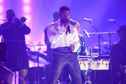 Jan 26, 2020; Los Angeles, CA, USA;  Usher performs a Prince tribute during the 62nd annual GRAMMY Awards on Jan. 26, 2020 at the STAPLES Center in Los Angeles, Calif. Mandatory Credit: Robert Hanashiro-USA TODAY