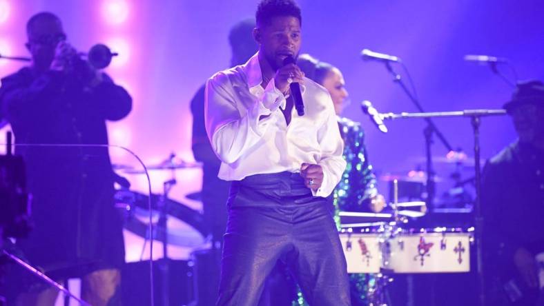 Jan 26, 2020; Los Angeles, CA, USA;  Usher performs a Prince tribute during the 62nd annual GRAMMY Awards on Jan. 26, 2020 at the STAPLES Center in Los Angeles, Calif. Mandatory Credit: Robert Hanashiro-USA TODAY