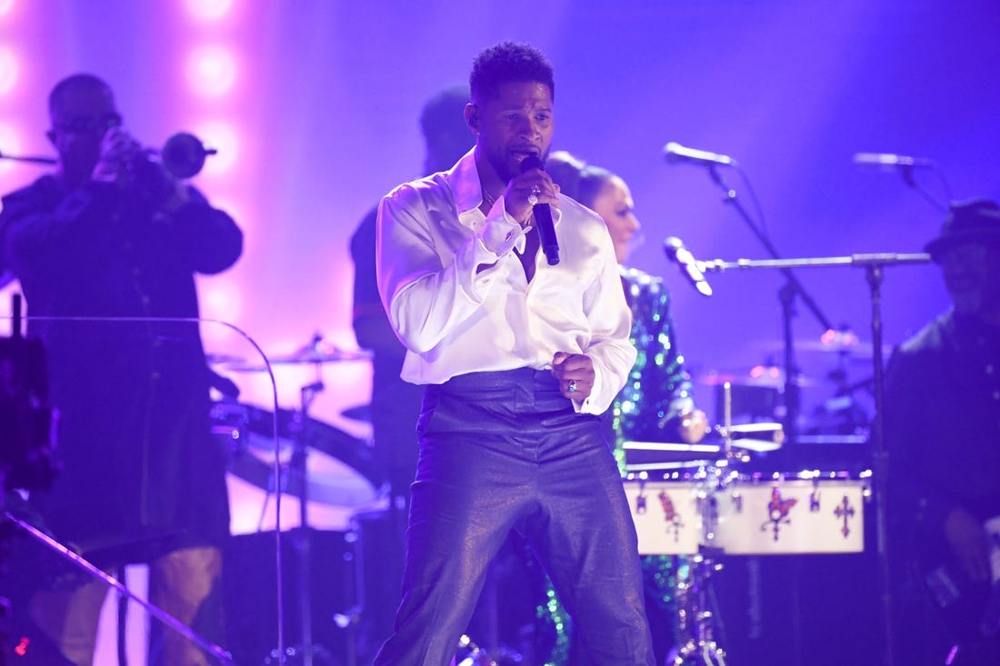 Jan 26, 2020; Los Angeles, CA, USA;  Usher performs a Prince tribute during the 62nd annual GRAMMY Awards on Jan. 26, 2020 at the STAPLES Center in Los Angeles, Calif. Mandatory Credit: Robert Hanashiro-USA TODAY