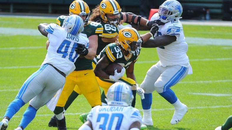 Green Bay Packers running back Aaron Jones (33) might be healthy enough to play Thursday against the Lions (file photo). Mandatory Credit: Michael McLoone-USA TODAY Sports