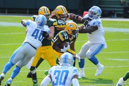Green Bay Packers running back Aaron Jones (33) might be healthy enough to play Thursday against the Lions (file photo). Mandatory Credit: Michael McLoone-USA TODAY Sports