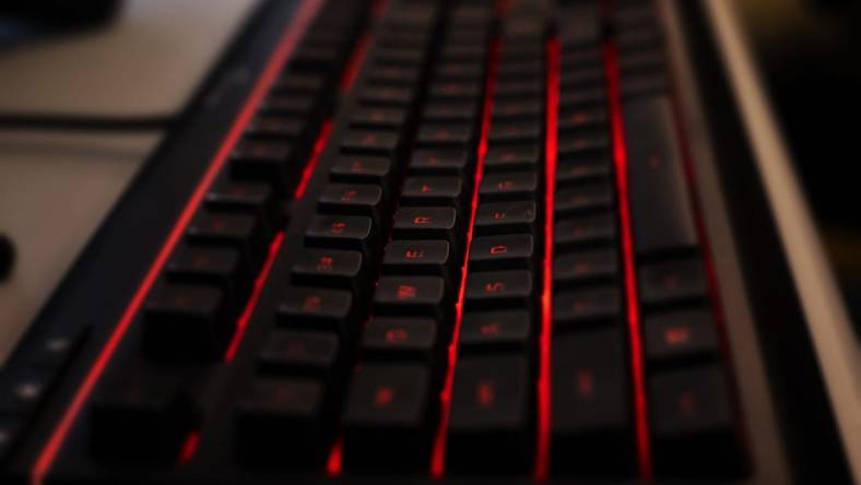 A custom gaming keyboard backlit with red LED lights waits for tactile input before Manual took on Boone County in a Rocket League match, which was streamed on YouTube on Thursday, March 5, 2020.