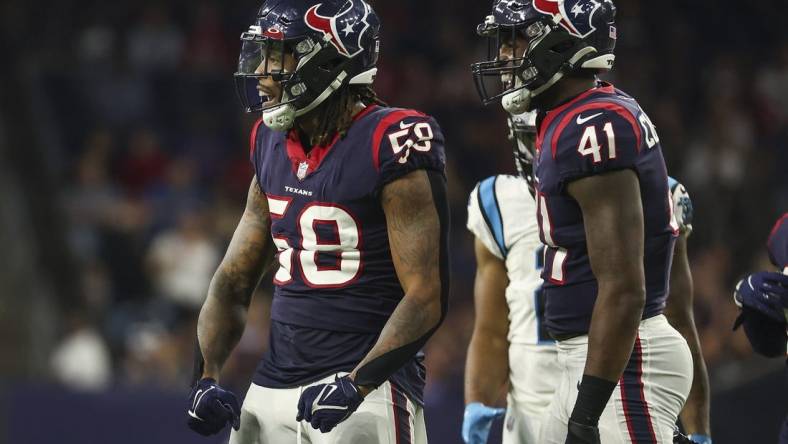 Sep 23, 2021; Houston, Texas, USA; Houston Texans outside linebacker Christian Kirksey (58) reacts after making a tackle during the third quarter against the Carolina Panthers at NRG Stadium. Mandatory Credit: Troy Taormina-USA TODAY Sports