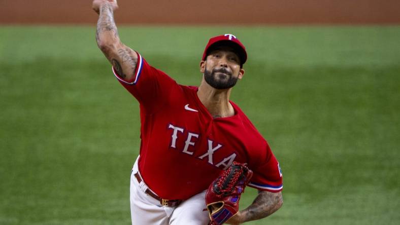 Jul 15, 2022; Arlington, Texas, USA; Texas Rangers starting pitcher Matt Bush (51) pitches against the Seattle Mariners during the first inning at Globe Life Field. Mandatory Credit: Jerome Miron-USA TODAY Sports