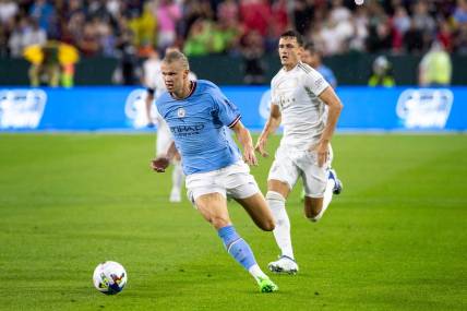 Manchester City forward Erling Haaland (9) runs the ball during the exhibition match against FC Bayern Munich on Saturday, July 23, 2022, at Lambeau Field in Green Bay, Wis.

Gpg Bayern Man City Match 7232022 0014