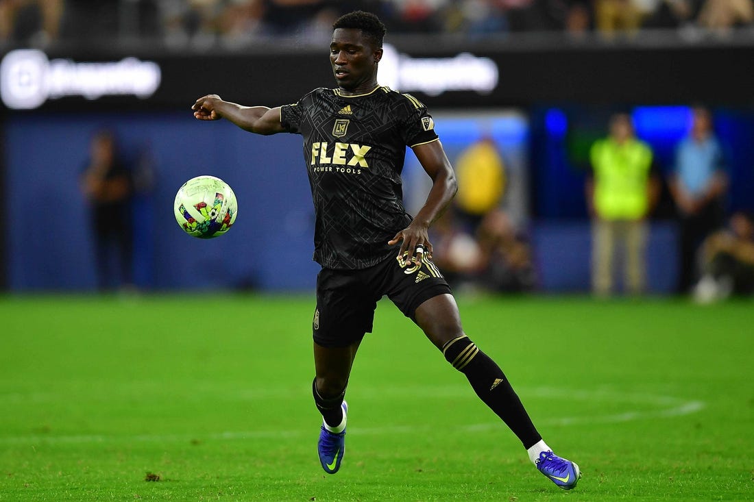 Aug 3, 2022; Los Angeles, California, US; LAFC defender Mamadou Fall (5) moves the ball against Club America during the first half at SoFi Stadium. Mandatory Credit: Gary A. Vasquez-USA TODAY Sports