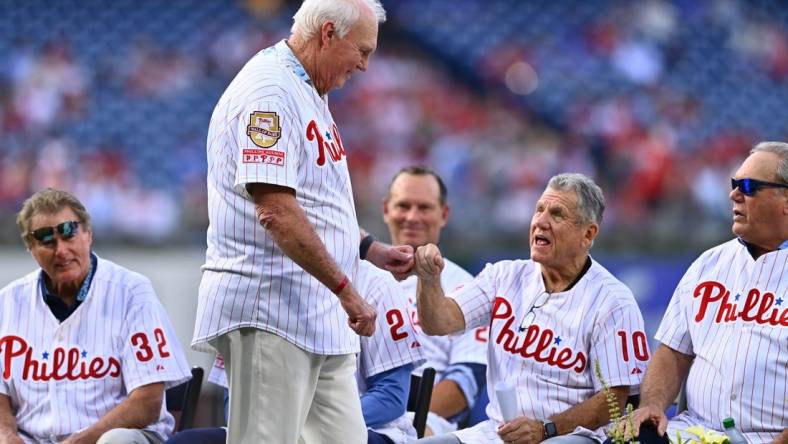 Aug 6, 2022; Philadelphia, Pennsylvania, USA; Former Phillies manager Charlie Manuel greets former Phillies manager Larry Bowa before the game between the Philadelphhia Phillies and Washington Nationals at Citizens Bank Park. Mandatory Credit: Kyle Ross-USA TODAY Sports