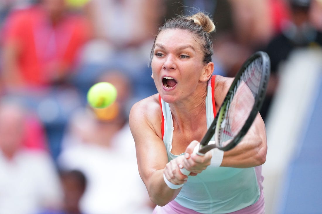 Aug 29, 2022; Flushing, NY, USA; Simona Halep of Romania hits to Daria Snigur of Ukraine on day one of the 2022 U.S. Open tennis tournament at USTA Billie Jean King National Tennis Center. Mandatory Credit: Danielle Parhizkaran-USA TODAY Sports