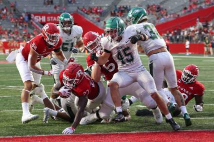 Sep 10, 2022; Piscataway, New Jersey, USA; Rutgers Scarlet Knights running back Samuel Brown V (27) runs for a touchdown against the Wagner Seahawks during the second half at SHI Stadium. Mandatory Credit: Ed Mulholland-USA TODAY Sports