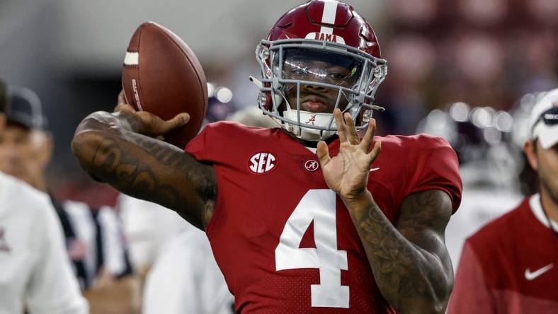 Oct 8, 2022; Tuscaloosa, Alabama, USA;  Alabama Crimson Tide quarterback Jalen Milroe (4) warms up before a game against the Texas A&M Aggies at Bryant-Denny Stadium. Mandatory Credit: Butch Dill-USA TODAY Sports